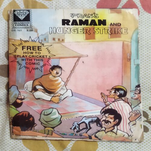 PRAN'S RAMAN AND HUNGER STRIKE (FRONT COVER DOWN SIDE BIG CUT AND BACK COVER LITTLE CUT ON RIGHT SIDE)