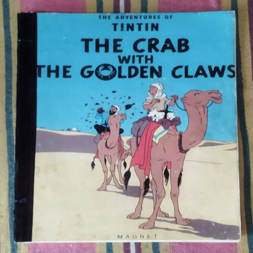 THE CRAB WITH THE GOLDEN CLAWS