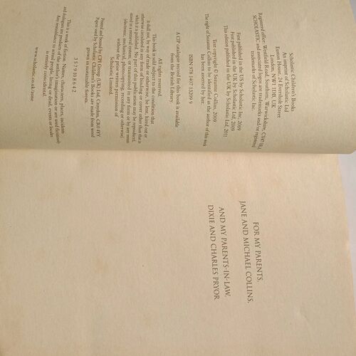 The Hunger Games Catching Fire (By Suzanne Collins)