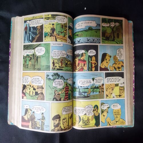 (INDRAJAL COMICS) (SINGLE BINDING 14 IN 1) 1.>GULAAMO KA SAUDAAGAR (BHAAG-1), 2.>GULAAMO KA SAUDAAGAR (BHAAG-2), 3.>HEERO KE CHOR, 4.>BHARAT BAHUBALI, 5.>VETALA KEE AAN, 6.>MAUT SE SAAMANA, 7.>CHAAR RAASTA KA BHOOT, 8.>RAHASYO KEE GHAATEE, 9.>BEEHAD KEE RAJAKUMAAREE, 10.>MAASOOM GUNAAH, 11.>NISHIDDH DVEEP, 12.>GHRNA KA DAAVAANAL, 13.>NAKALEE CHEHARE, 14.>VISH KANYA