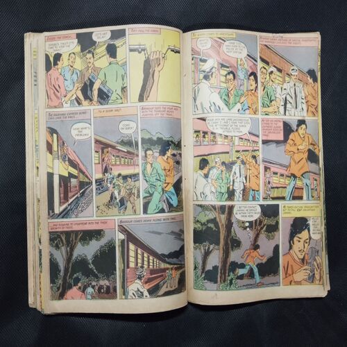 (INDRAJAL COMICS) (SINGLE BINDING- 14 IN 1) (LANGUAGE- ENGLISH), 1.>THE JAIL BREAK, 2.>THE HAUNT OF THE GHOST, 3.>THE PHANTOM'S ADORED GEM (PAET-1), 4.>THE PHANTOM'S ADORED GEM (PART-2), 5.>BAHADUR & THE CHILD-LIFTERS, 6.>THE SINISTER WORLD OF `8', 7.>THE BATTLE OF GIANTS, 8.>THE LAW-BREAKERS, 9.>50,000 MILES IN SPACE, 10.>THE SECRET ASSIGNMENT, 11.>VIDROHEE DAANAV, 12.>BHAIKH KA KHAJAANA, 13.>BHEESHMA, 14.>DHRUVA.