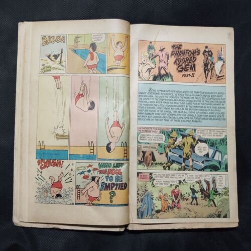 (INDRAJAL COMICS) (SINGLE BINDING- 14 IN 1) (LANGUAGE- ENGLISH), 1.>THE JAIL BREAK, 2.>THE HAUNT OF THE GHOST, 3.>THE PHANTOM'S ADORED GEM (PAET-1), 4.>THE PHANTOM'S ADORED GEM (PART-2), 5.>BAHADUR & THE CHILD-LIFTERS, 6.>THE SINISTER WORLD OF `8', 7.>THE BATTLE OF GIANTS, 8.>THE LAW-BREAKERS, 9.>50,000 MILES IN SPACE, 10.>THE SECRET ASSIGNMENT, 11.>VIDROHEE DAANAV, 12.>BHAIKH KA KHAJAANA, 13.>BHEESHMA, 14.>DHRUVA.