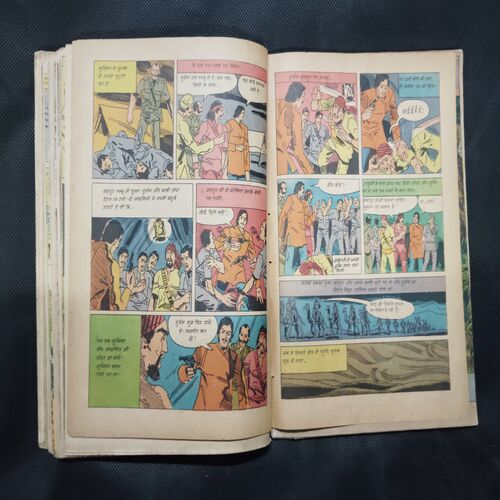(INDRAJAL COMICS) (SINGLE BINDING- 14 IN 1) (LANGUAGE- ENGLISH), 1.>THE JAIL BREAK, 2.>THE HAUNT OF THE GHOST, 3.>THE PHANTOM'S ADORED GEM (PAET-1), 4.>THE PHANTOM'S ADORED GEM (PART-2), 5.>BAHADUR & THE CHILD-LIFTERS, 6.>THE SINISTER WORLD OF `8', 7.>THE BATTLE OF GIANTS, 8.>THE LAW-BREAKERS, 9.>50,000 MILES IN SPACE, 10.>THE SECRET ASSIGNMENT, 11.>VIDROHEE DAANAV, 12.>BHAIKH KA KHAJAANA, 13.>BHEESHMA, 14.>DHRUVA.
