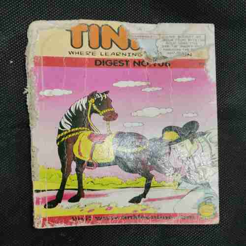 TINKLE (DOUBLE DIGEST NO- 106) front cover uper side littel cut.