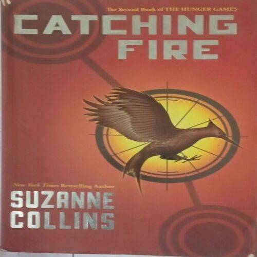 Catching Fire. (By Suzanne Collins).