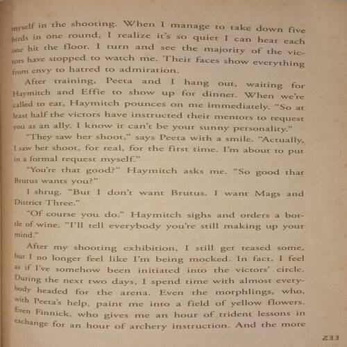 Catching Fire. (By Suzanne Collins).