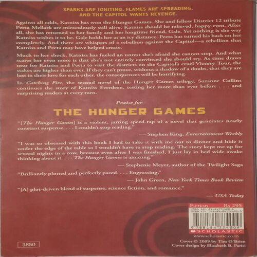 Catching Fire. (By Suzanne Collins).