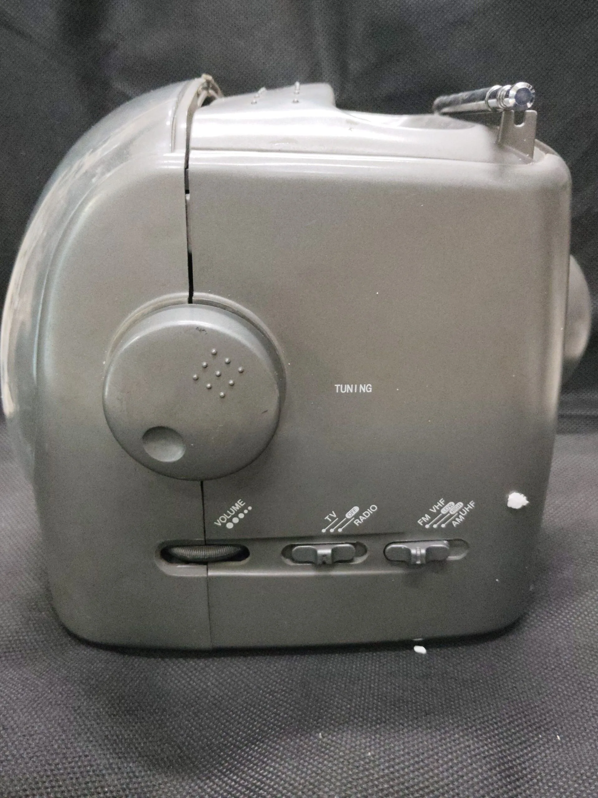 Portable 5.5 B/W TV With AM/FM Radio ( Radio reel is slightly loose ).