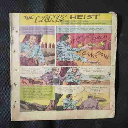 THE BANK HEIST (FIRST PAGE RIGHT SIDE LITTLE CUT AND PAGE NO-15 BIG CUT AND STORY IMPACT OR COVER LESS)