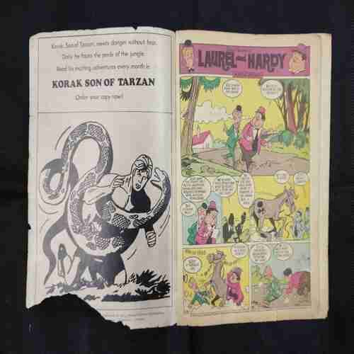 LAUREL AND HARDY (NO-124) (FRONT COVER DOWN SIDE BIG CUT)