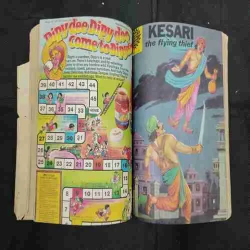 AMAR CHITRA KATHA (SINGLE BINDING-14 IN 1)  PANCHATANTRA,ARUNACHAL PRADESH, PANCHATANTRA, JATAKA TALES MOUSE MERCHANT,GOPAL MEASURES THE EARTH,.................,BIKAL THE TERRIBLE AND THE TIGER-TAMERS,ANDHER NAGARI,KESARI,SATWANT KAUR, THE ADVENTURES OF BADOU AND CHHOTU,DAMAJI PANT AND NARHARI,THE SILENT TEACHER,CHANDRALALAT.