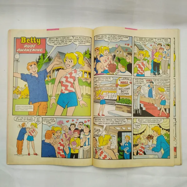 comic books, vintage comics, collectible comics, Archie comics, Betty Cooper, Prize Pool, teen comics, classic comics, old comics, retro comics, comic collector, comic store, comic sale, comic marketplace, illustrated comic, comic collection, Betty and Veronica, Riverdale, teenage comedy, American comics, comic auction, kids edition, pop culture, girls comics