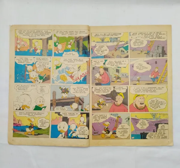comic books, vintage comics, collectible comics, Disney comics, Donald Duck, classic comics, adventure comics, humor comics, kids comics, children comics, retro comics, comic collector, comic store, comic sale, comic marketplace, educational comics, family comics, collector comics, comic collection, Disney characters, illustrated comic, comic auction