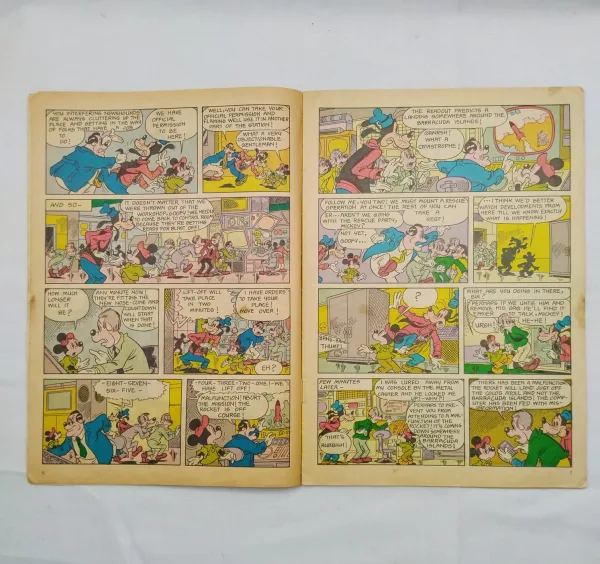 comic books, vintage comics, collectible comics, Disney comics, The Golden Rocket, Mickey Mouse, Woofy, illustrated comic, classic comics, adventure stories, children comics, kids comics, retro comics, comic collector, comic store, comic sale, comic marketplace, educational comics, fantasy comics, collector comics, comic collection, Disney characters, illustrated stories, comic auction, family comics