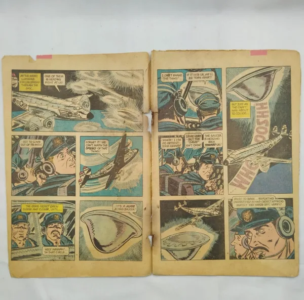 UFO comics, flying saucers, vintage comics, Gold Key comics, sci-fi comics, alien encounters, extraterrestrial mystery, space comics, pulp comics, 1970s comics, collectible comics, classic comics, pop culture, conspiracy comics, unsolved mysteries, abduction comics, retro science fiction, comic collector, rare comics, unexplained phenomena, close encounters, government cover-up, eyewitness accounts, classic sci-fi, paranormal comics, comic book auction, outer space, X-Files, alien legends, ancient aliens, spacecraft mystery