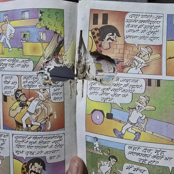 Chacha Chaudhary aur Batsman Paltan - Torn, A hole in center- Story impacted