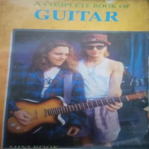 A Complete Book OF Guitar ,By = (Dan Margan ) ,Total pages=(249 ) damage Cover page