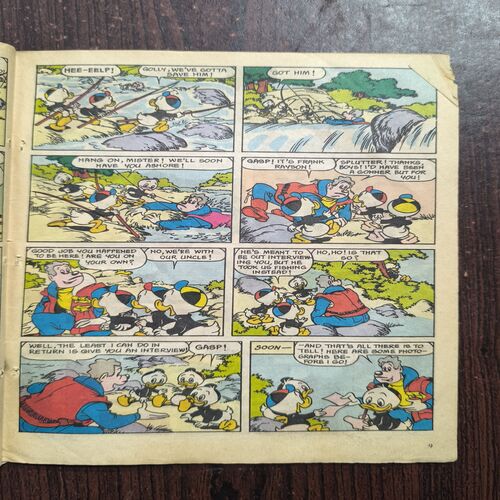 Document 3_68 A DEDICATED REPORTER ( No-9007 ) Back Cover Down Side Small Cut