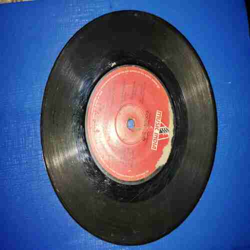 Document 6_16 VINYL RECORDS (small) Hindi film :COOLIE , 45RPM , 1983