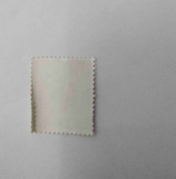 QUEEN ELIZABETH 9 Pence POSTAGE , GREAT BRITAIN 1976 STAMP