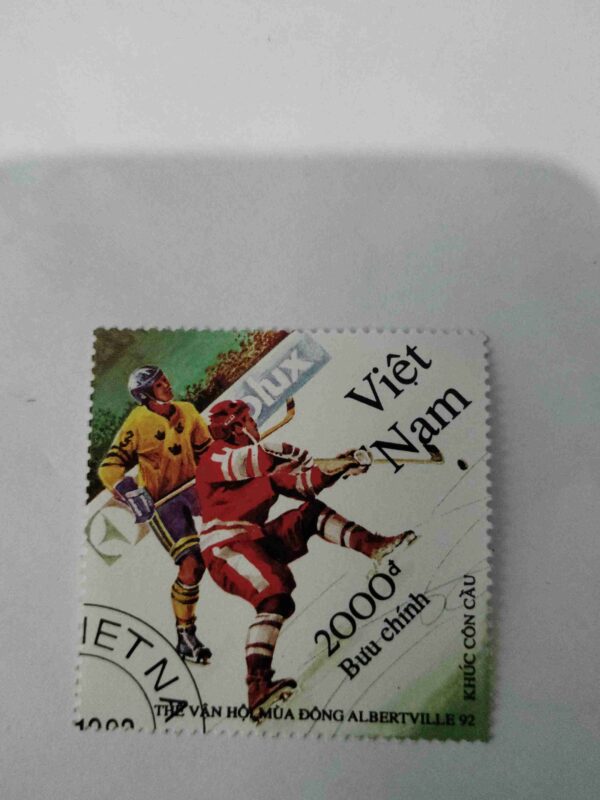 Document_7 1992 VIETNAM 2000d POSTAGE , ALBERTVILLE WINTER OLYMPIC GAMES HOCKEY SCENE STAMP