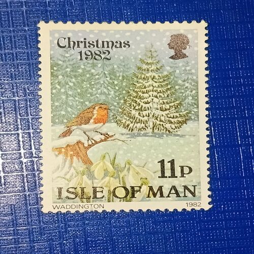 CHRISTMAS 1982 ISLE OF MAN 11P POSTAGE STAMP CHRISTMAS 1982 ISLE OF MAN 11P POSTAGE STAMP